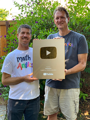 Rob and Jeremy holding YouTube award